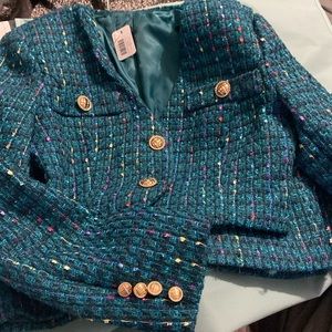 Gorgeous multi colored skirt and jacket suit.